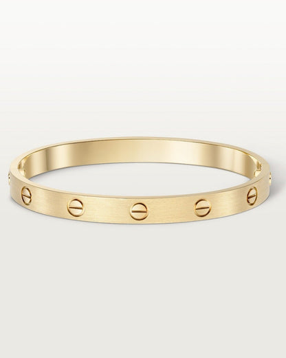 Brățară Jonc Aurie Minimalistă – Eleganță Discretă Și Atemporală 